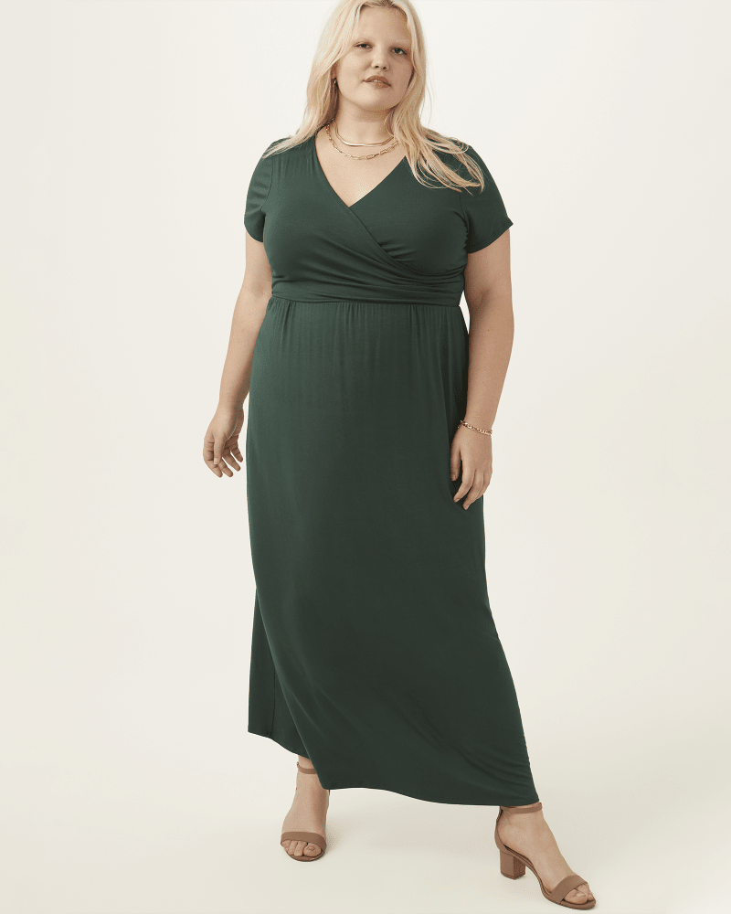 Plus size model with hourglass body shape wearing Carnation Wrap Maxi Dress by Meri Skye | Dia&Co | dia_product_style_image_id:201869